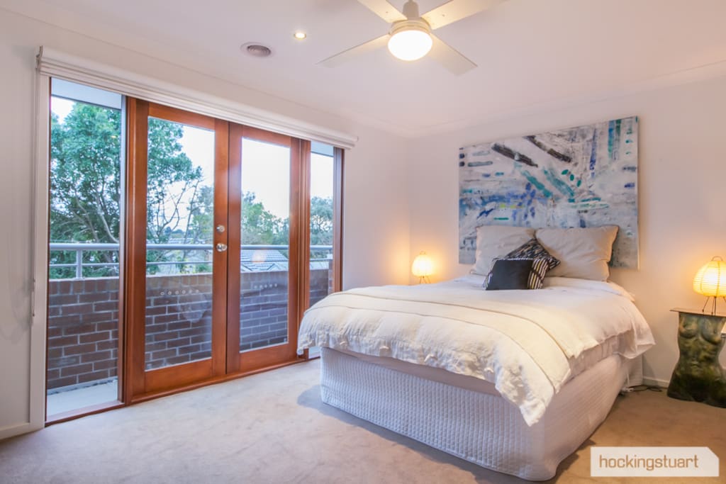 Master bedroom, complete with balcony and ensuite (with toilet & shower)