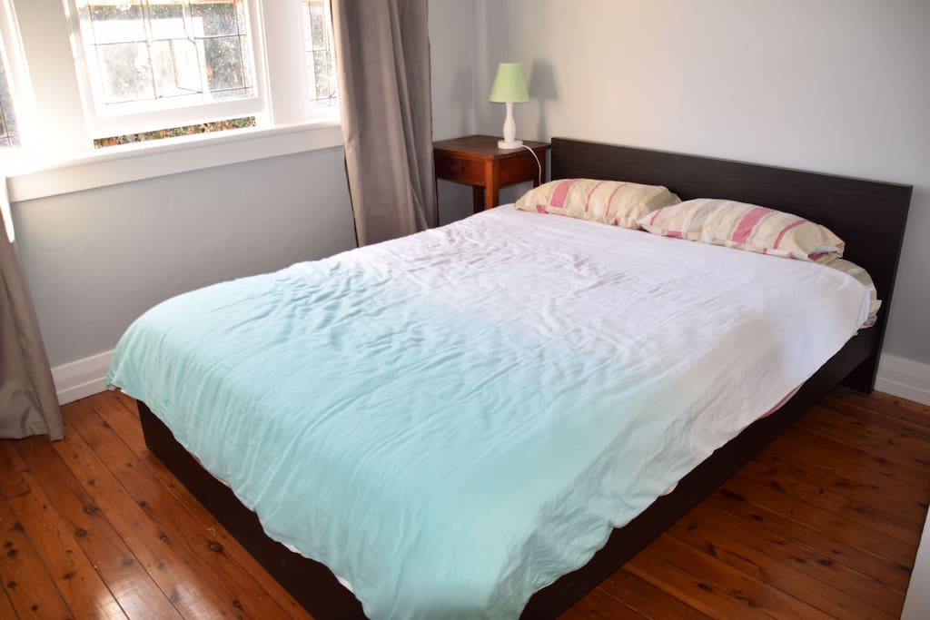 Comfortable and light filled Queen room