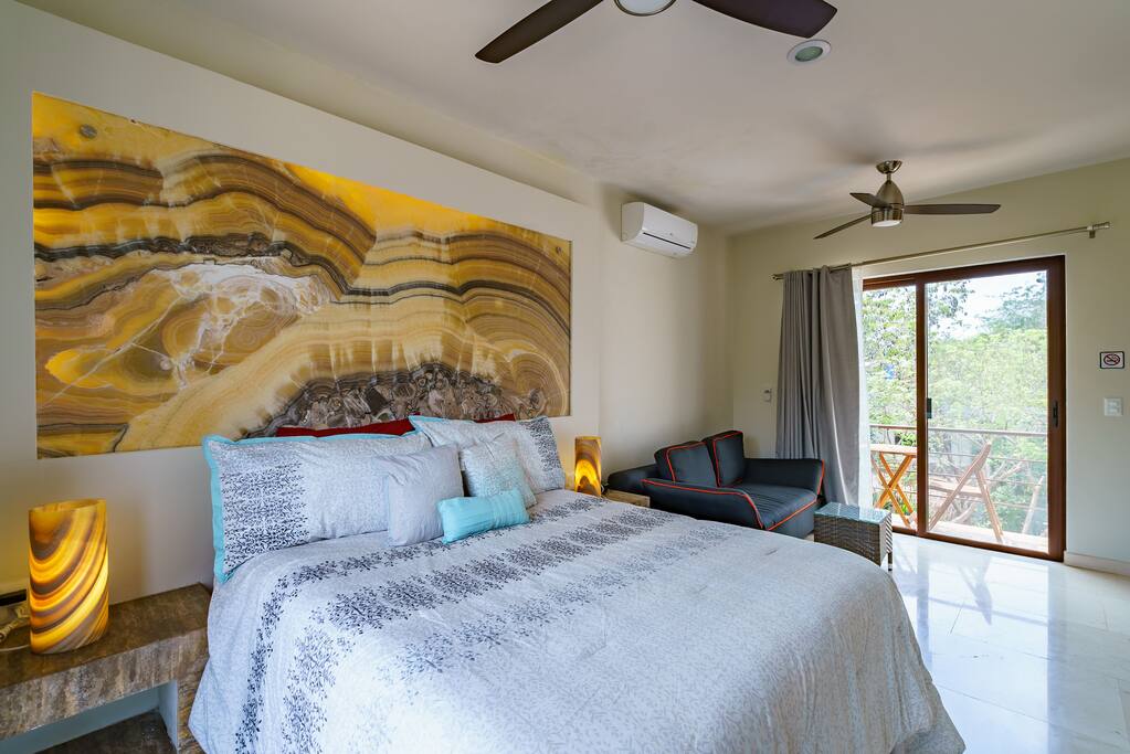 Enjoy relaxing in a comfy bed after your day of exploring