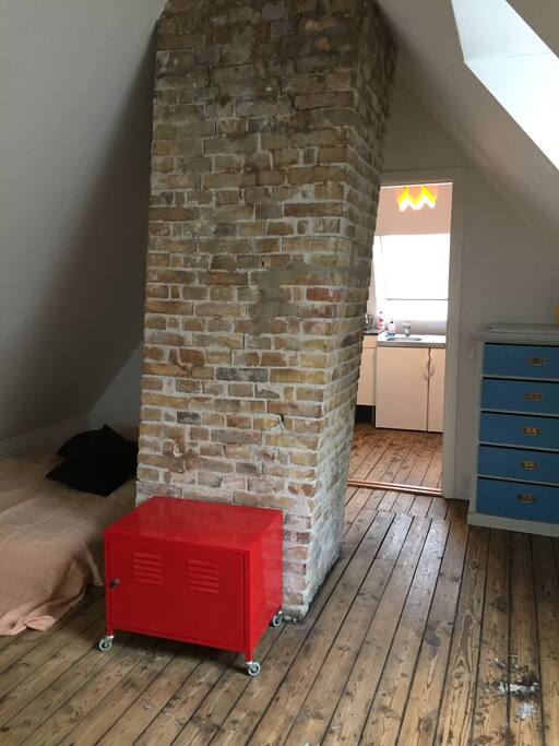 the loft you can see bed and kitchen