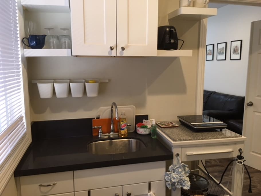 From the mini-kitchen, there is a door to your spacious studio.