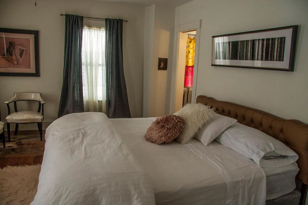 The Clare Q room with a king bed. Ensuite bath.
