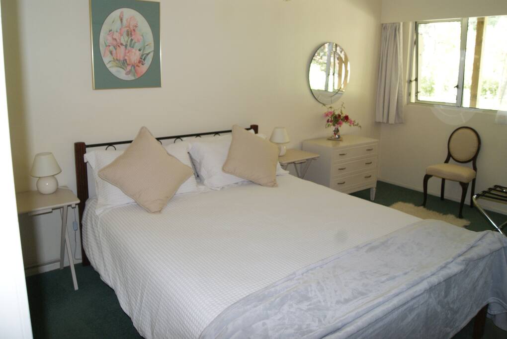 First bedroom with queen bed.