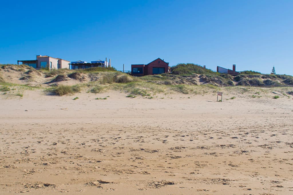 Vista de la casa desde la playa