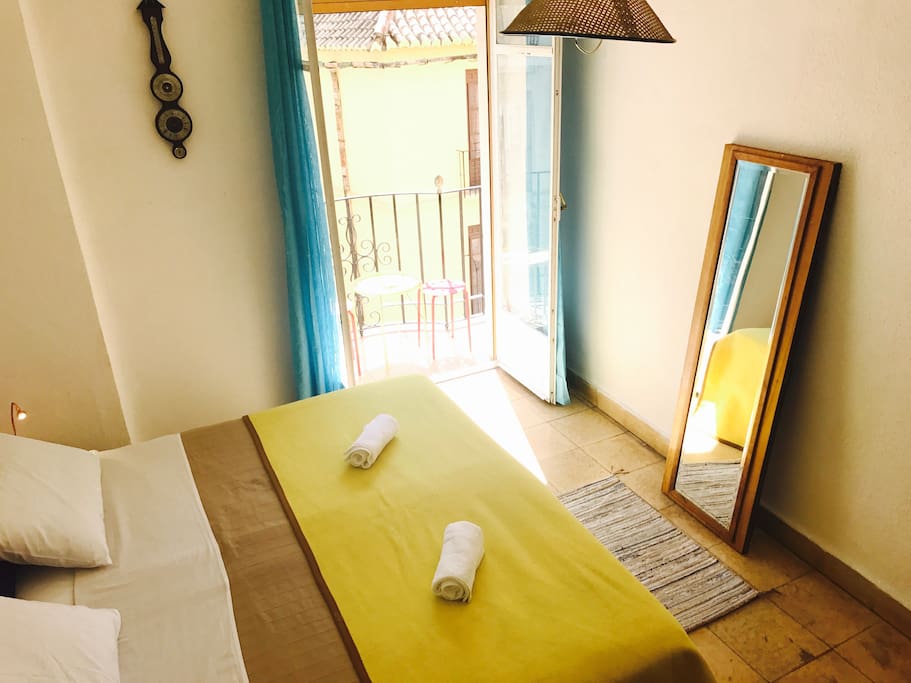 Bedroom with sunny balcony