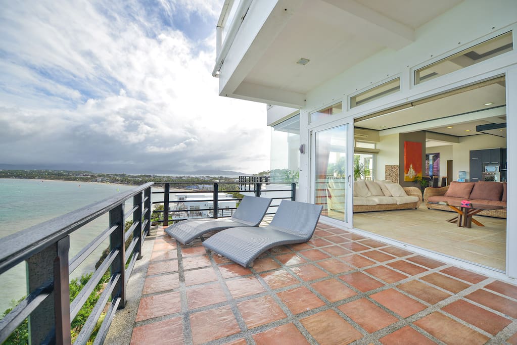 Private Large Terraces with lounge chairs and seating areas!!