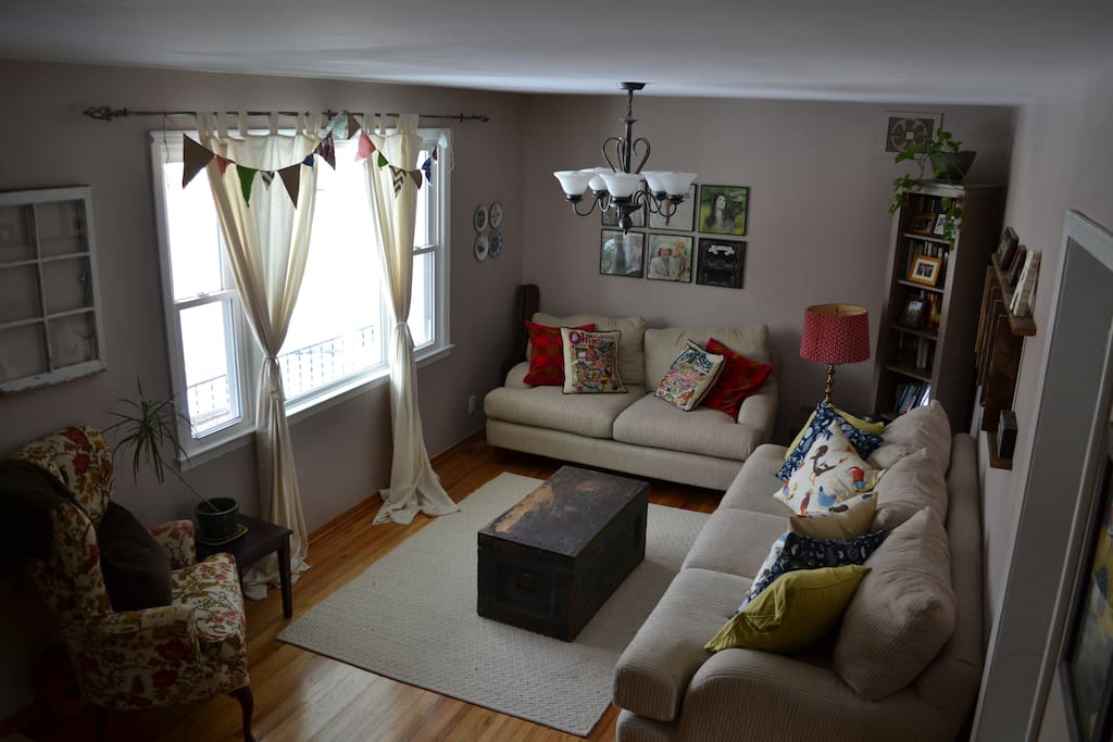 living room on 1st floor; has large couch and small sofa