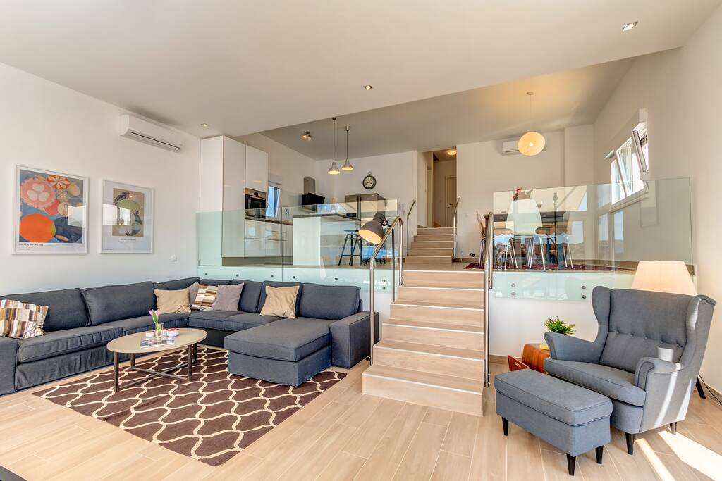 Open plan living dining kitchen room on 2 levels