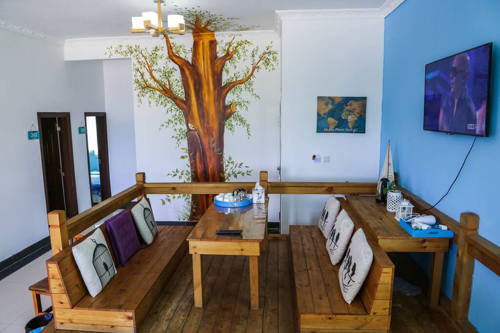 Living room featured with wooden sofa in the 3rd floor