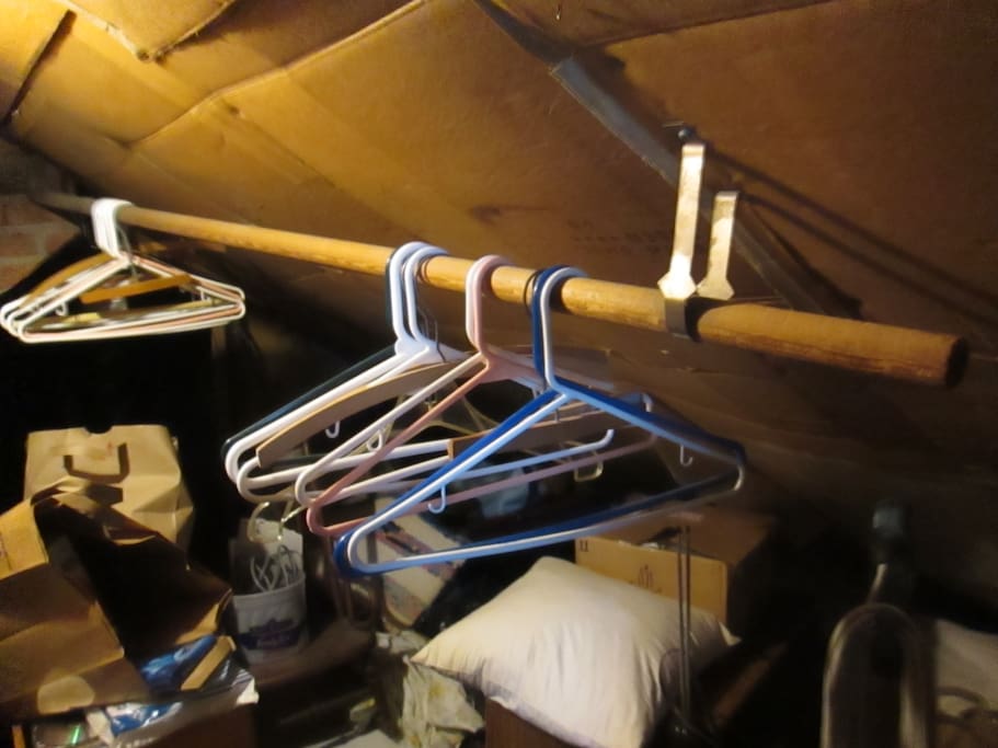Attic space for hanging clothes