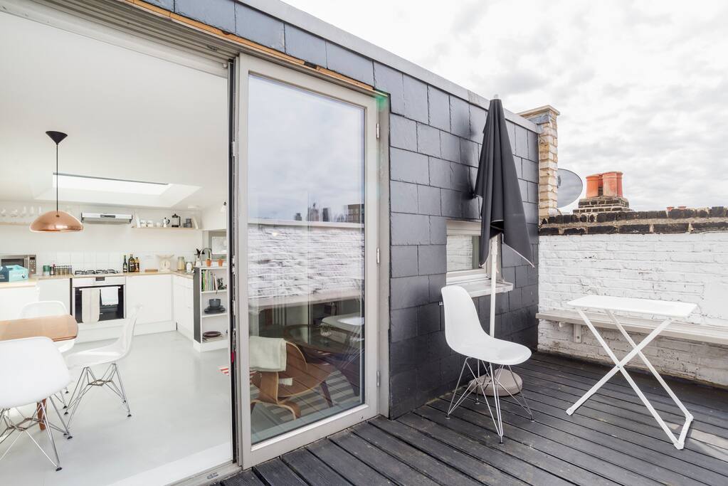 Outdoor patio, overlooking the city skyline