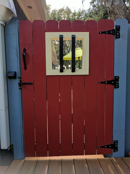 Behind the red gate....to your studio