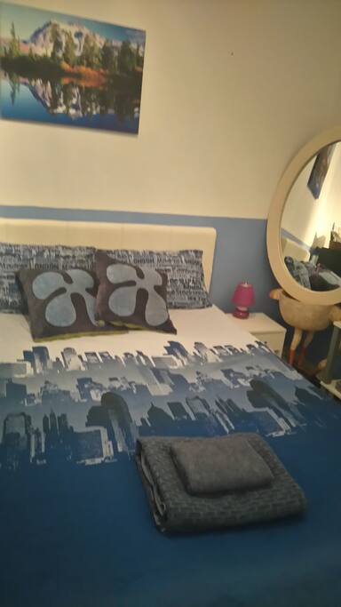 Big bed, big mirror, big all in this room.