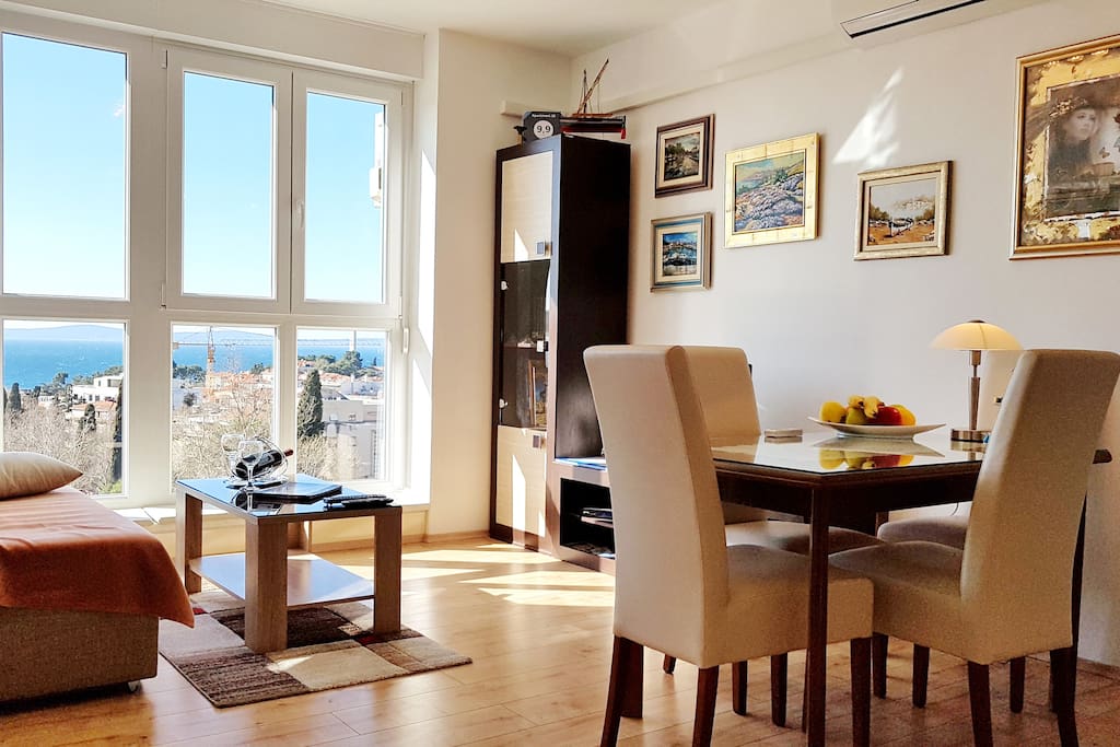Living room - dining table, sofa and coffee table