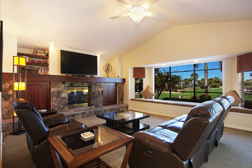 Family Room with fireplace and golf course view