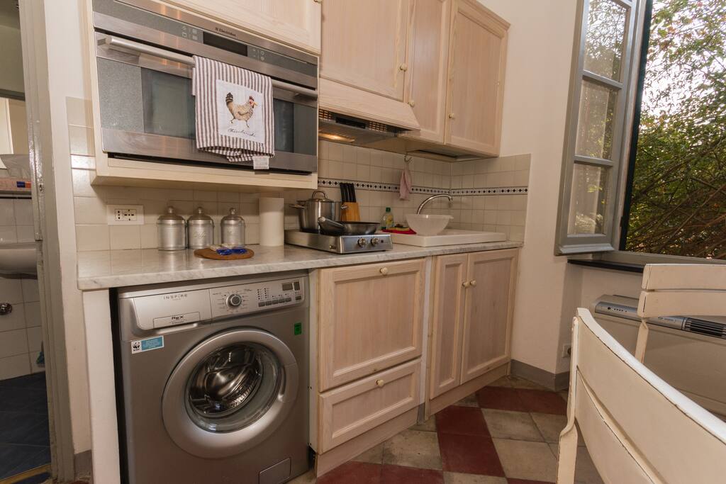 Full kitchen with oven and induction hub