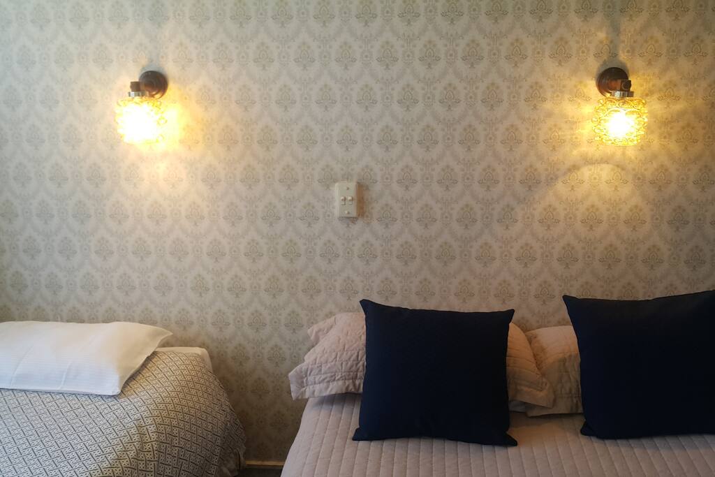 Bed room with a double bed and a single bed