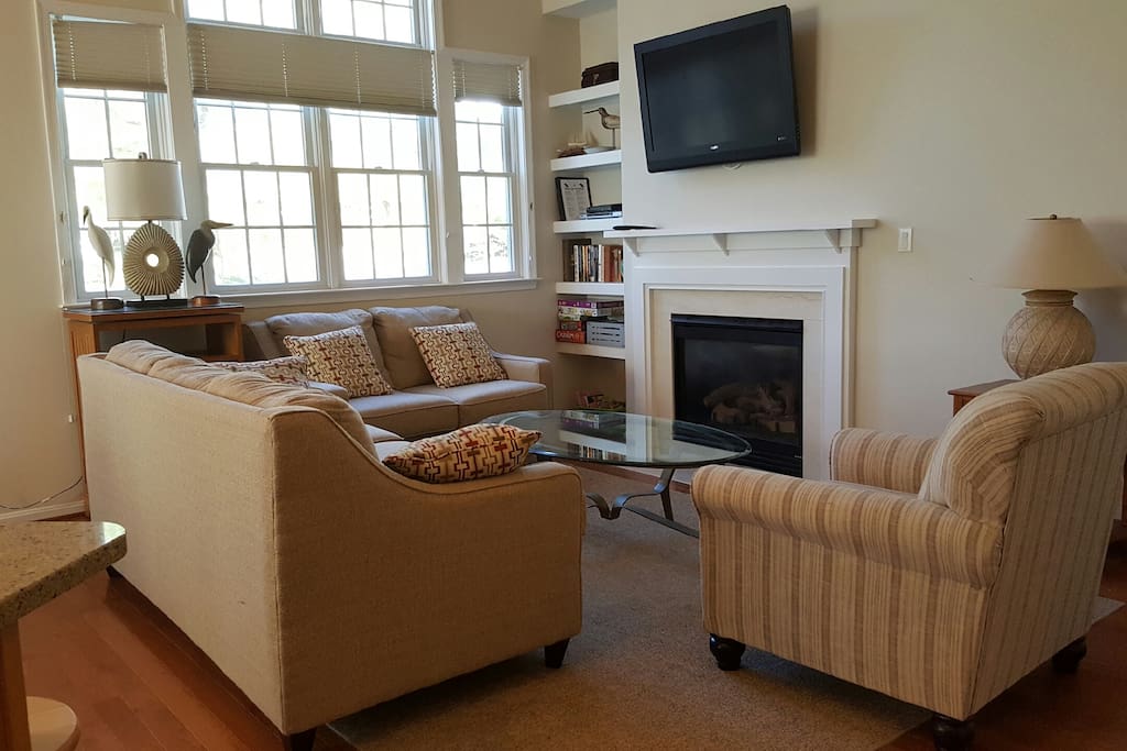 Living room with flat screen TV and ample seating