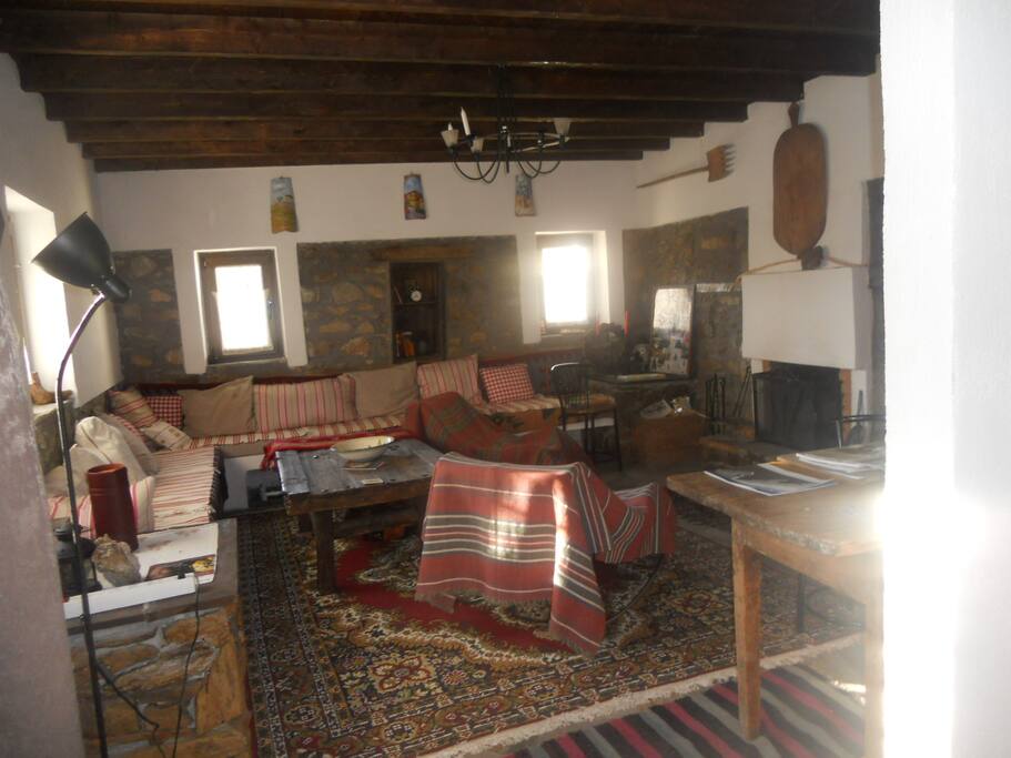 A REALLY BIG LIVING ROOM ON THE GROUND FLOOR WITH THE FIRE PLACE.THE...MEETING POINT OF THE HOUSE.
