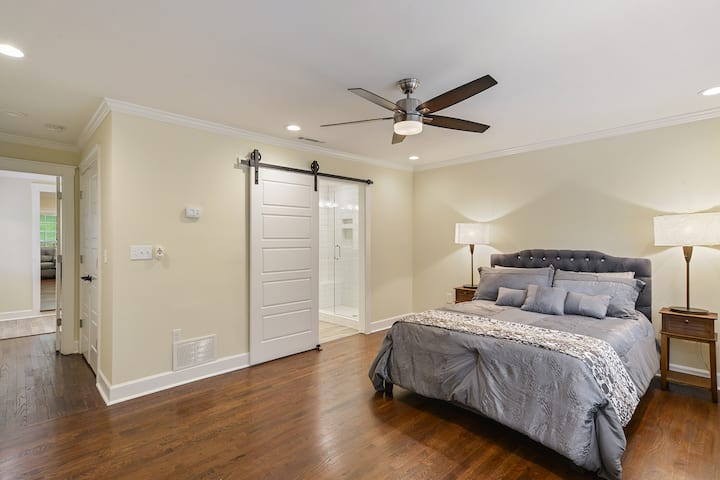 Large Master Bedroom with its own Full Size Bathroom with Oversize Shower & Bench Seating; Double Vanity extra long; 42" Flat Screen Smart TV w/Roku