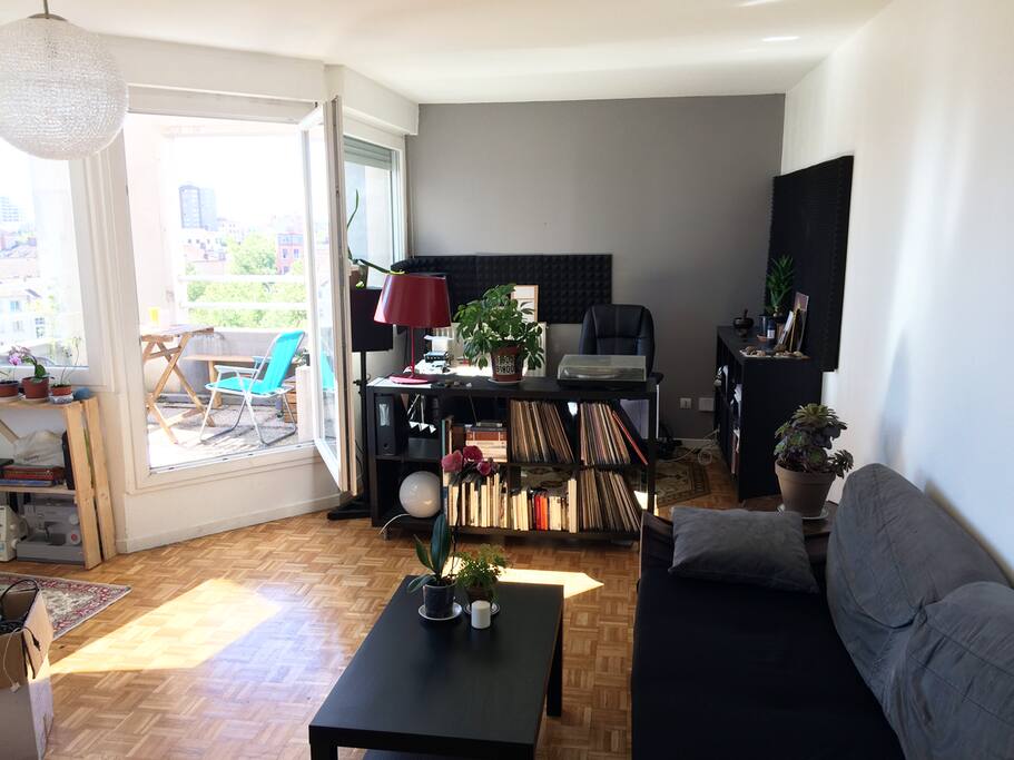 Salon avec canapé lit