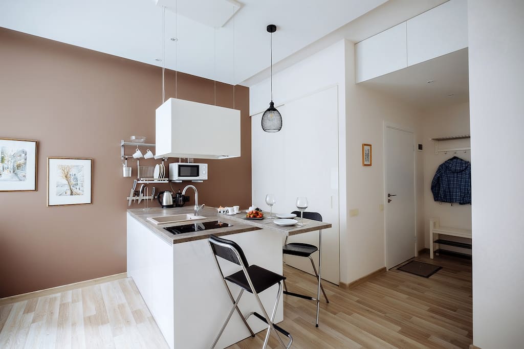 Well equipped kitchen area with a space for breakfasts and dinners