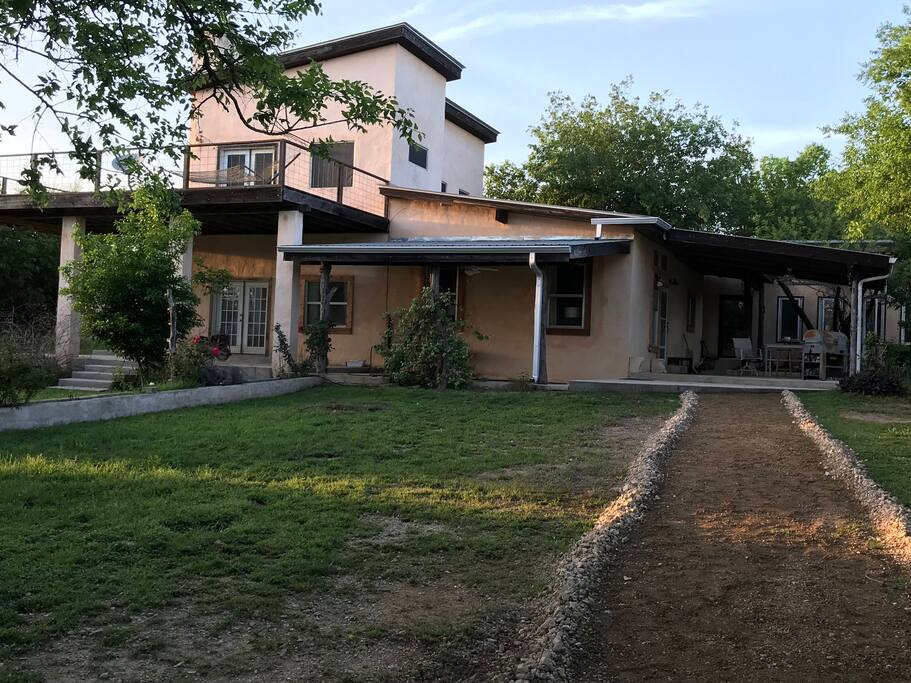 Covered patio on three sides, down and up.