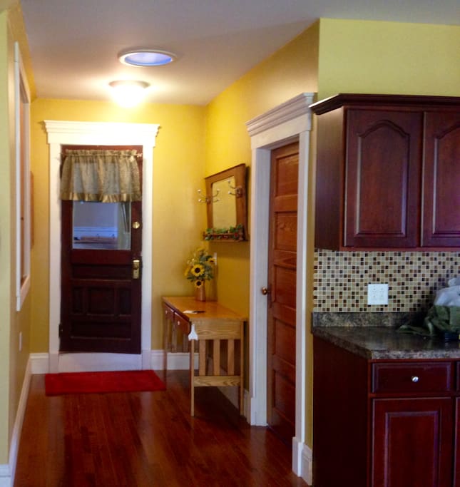 There is an entrance into the old house. The apartment is a new space above the 30 by30 ft garage.