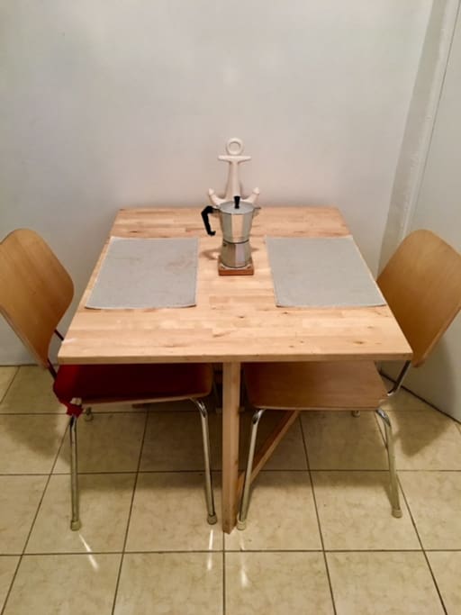 Dining Table that opens up to seat more.