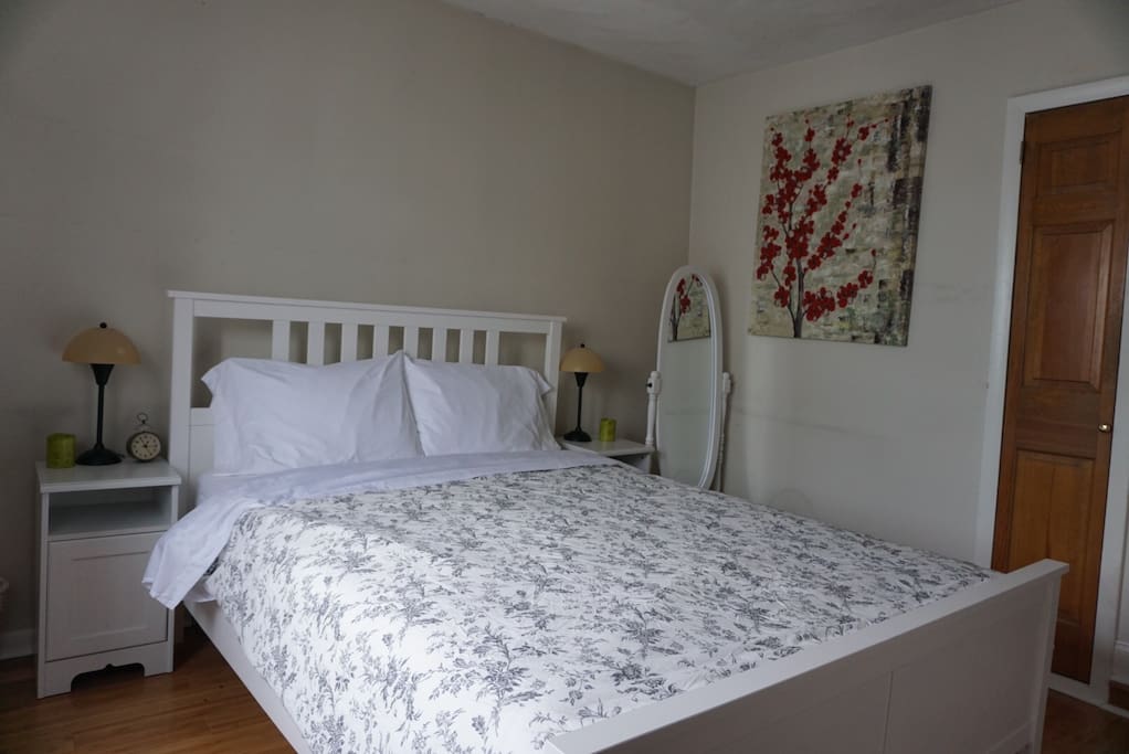 Queen size bed for two guests