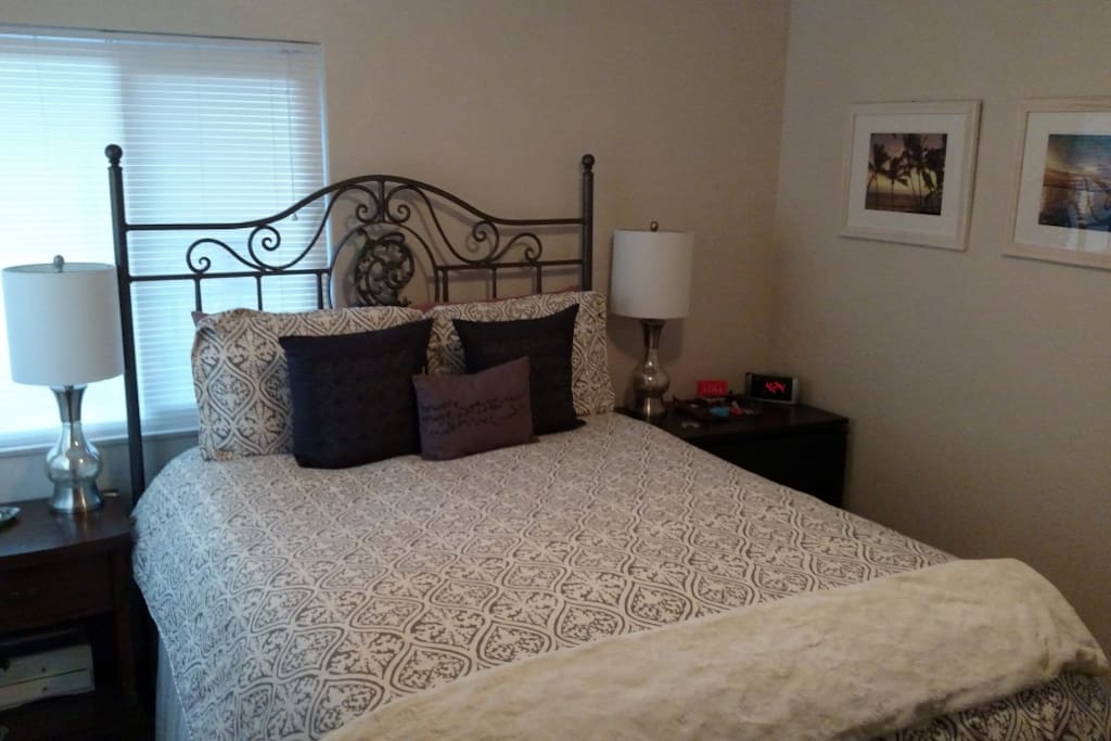 Master bed with super comfy Queen and down comforter.