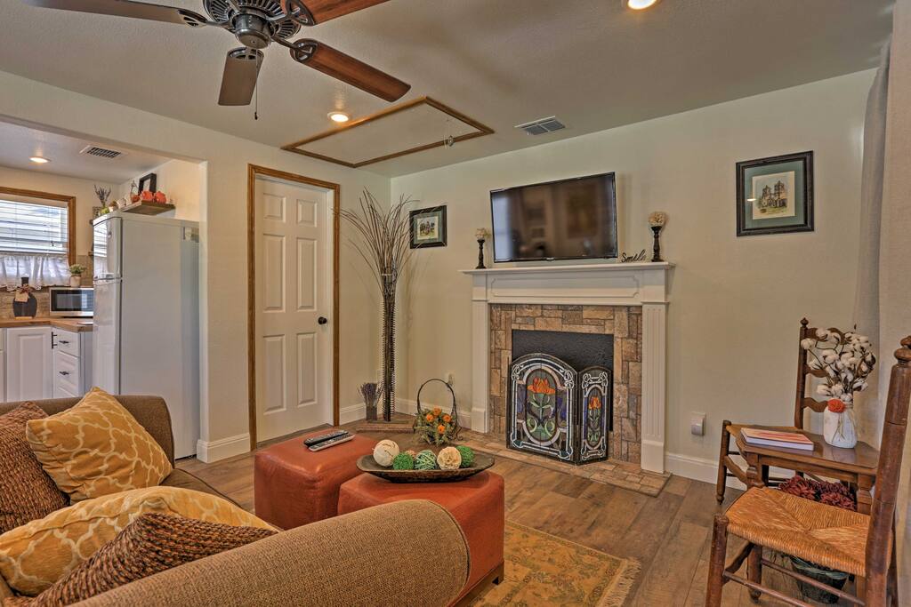 Watch your favorite movie on the flat-screen LED HD cable TV in the living room.