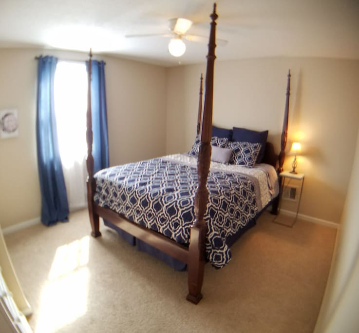 Comfy private space with queen bed, closet and smart TV.