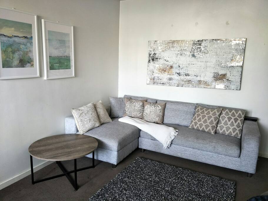 Lounge room with fold out sofa bed, large TV, Wi-Fi, chrome cast, reverse cycle heating and cooling.