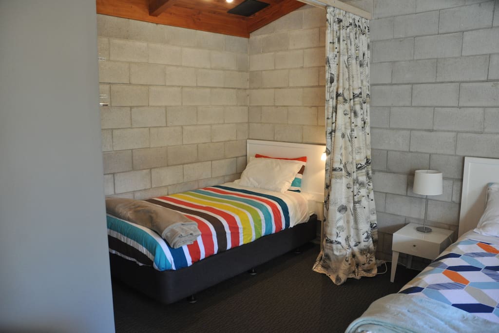 King Single Bed with curtain to separate from Queen Bed