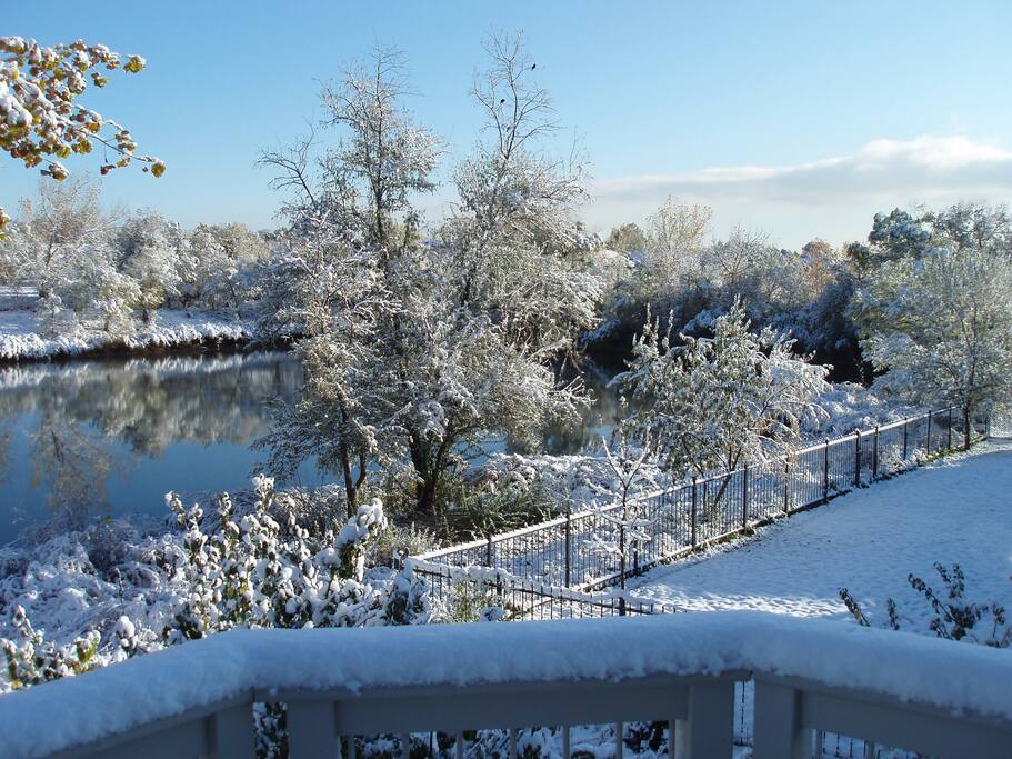 View of little lake behind the house in winter from the upstairs deck.