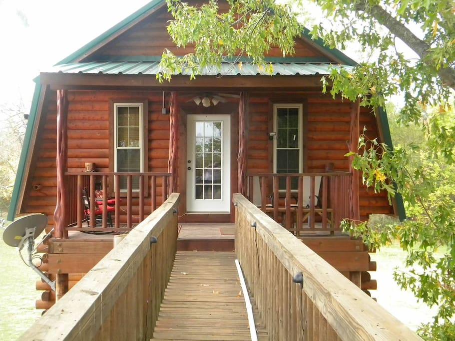 The French door leads from the bedroom out to a veranda with gorgeous views of the Ranch and surrounding woods.