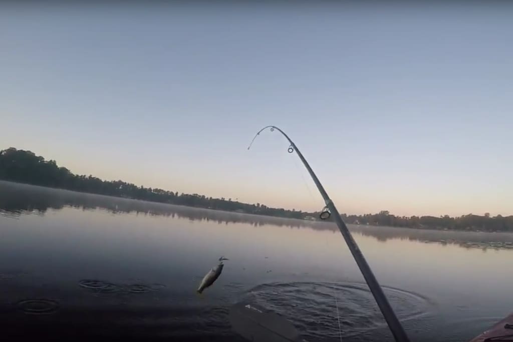 Fishing on Sunset lake in the early morning
