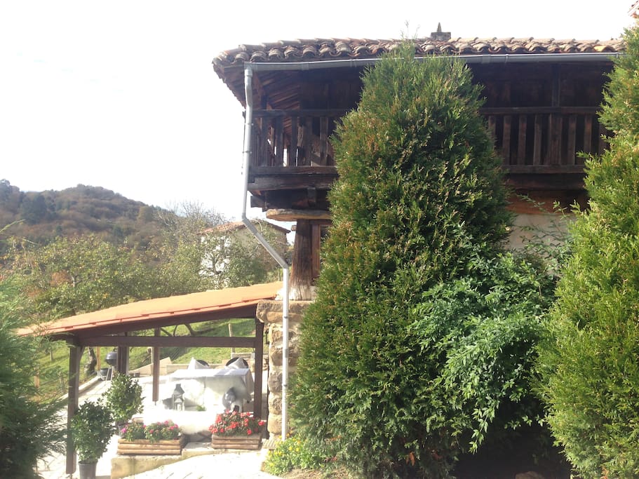 Side view of 'La Casina'. With Private Garden and outdoor area at LG Level. Open kitchen and living area at Ground Floor Level. And through an internal handmade staircase at 1st floor level the Master bedroom with full en-suite