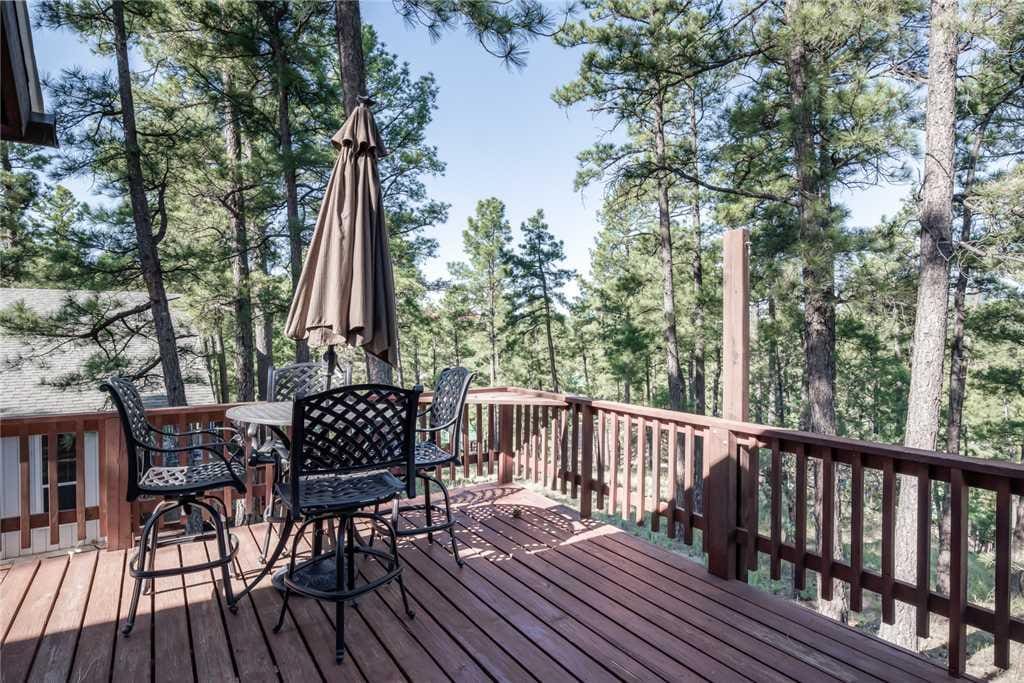 The deck is perfect for entertaining and relaxing. Grab a cup of coffee in the morning or a refreshing cool beverage in the eveni