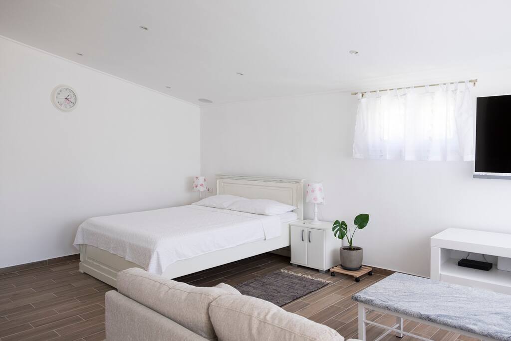 cozy living area with the bed
