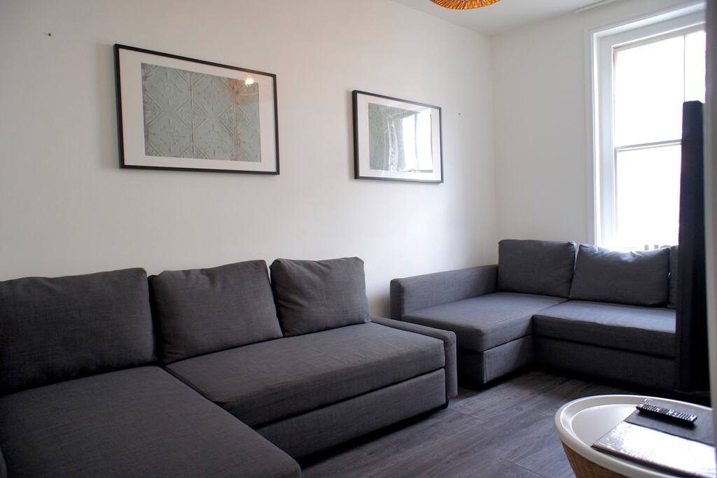 Here's your living room with two double sofa-beds