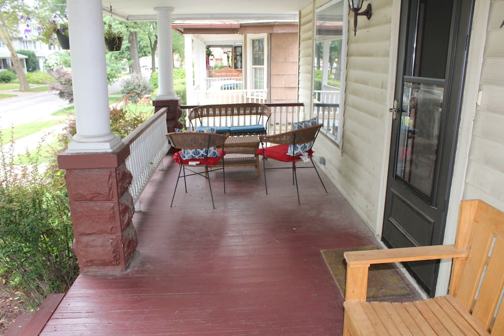 View of front porch with bench and seating area