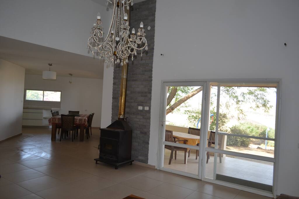 view of the dining area and outside covered porch from the living area.