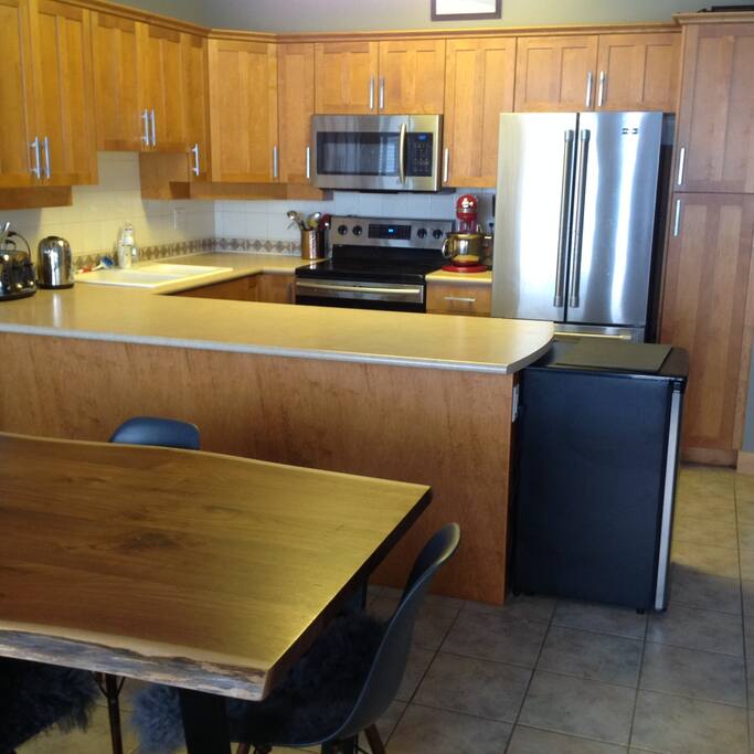 Full kitchen with seating for six.