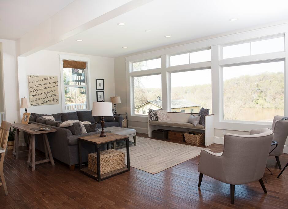 Open living room with view of James River and Scott's Mill Dam