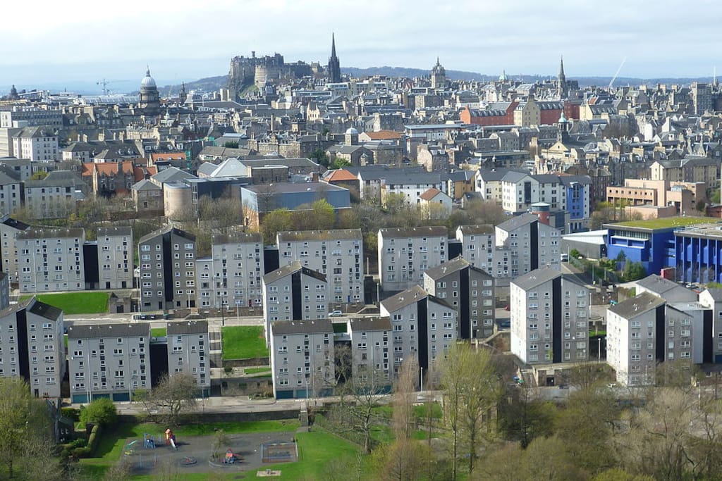 flats with Edinburgh city and Holyrood Park, Castle in background