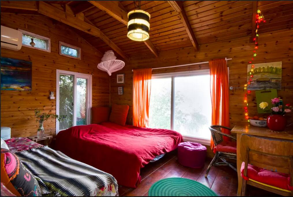 the Airbnb photographer did a good job:) in reality its smaller. just the size of a normal room