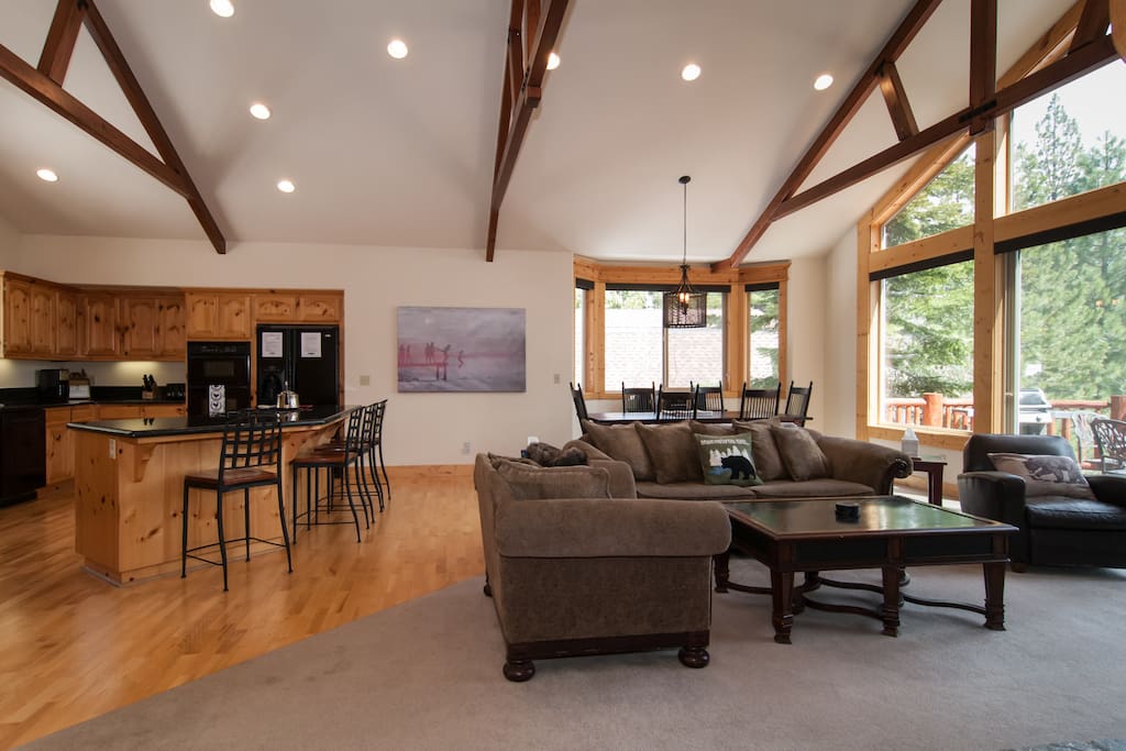 Great Room on upper level, kitchen to the left, dining area in back, and sitting area in front