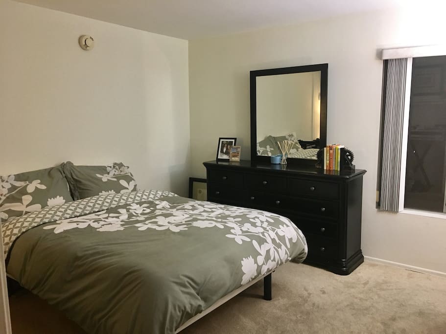 Good size room with Queen Bed, closets and storage